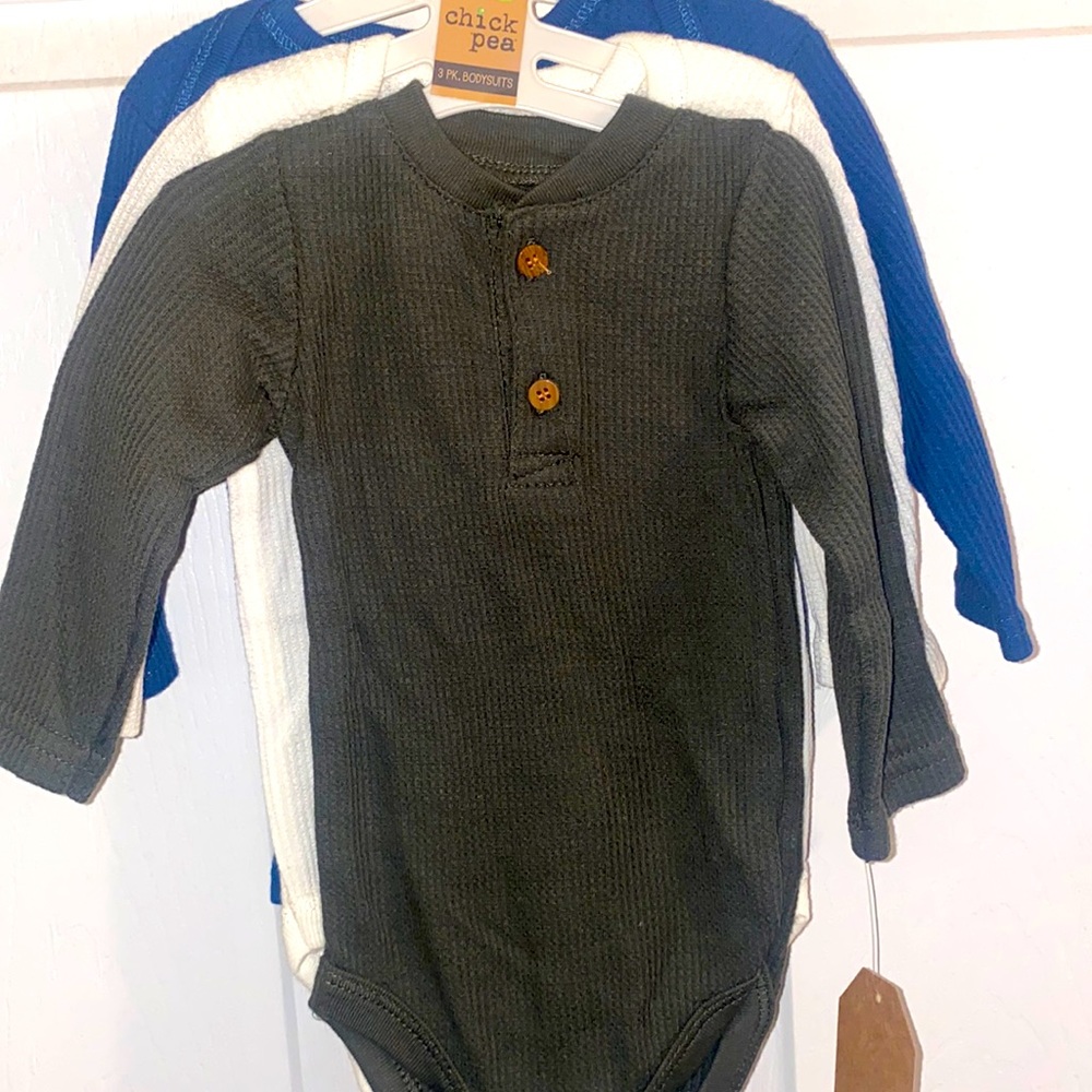 3 onesie’s brand new with tags and hanger boy solid colors